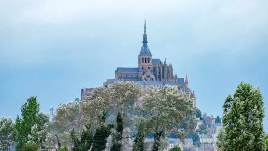 Mont Saint-Michel rocky islet and medieval abbey in Brittany France at low tide