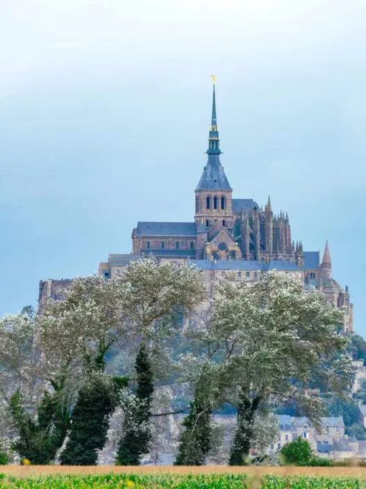 Mont Saint-Michel rocky islet and medieval abbey in Brittany France at low tide