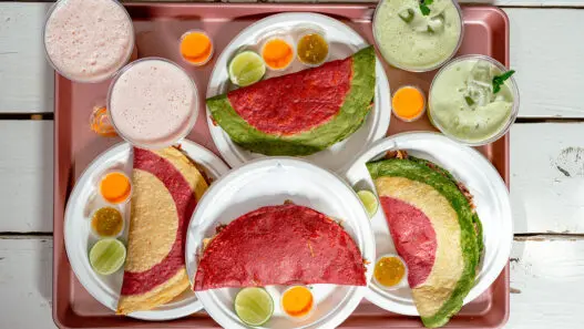 Locals Know ATX Taco Tour group walking through East Austin on Manor Road