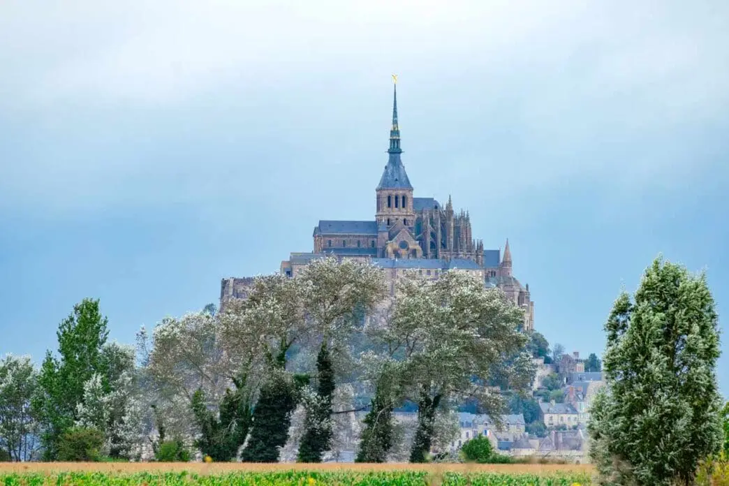 Mont Saint-Michel rocky islet and medieval abbey in Brittany France at low tide