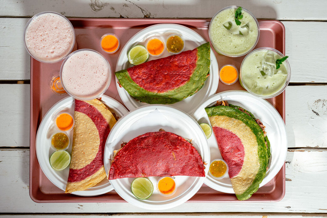 Locals Know ATX Taco Tour group walking through East Austin on Manor Road