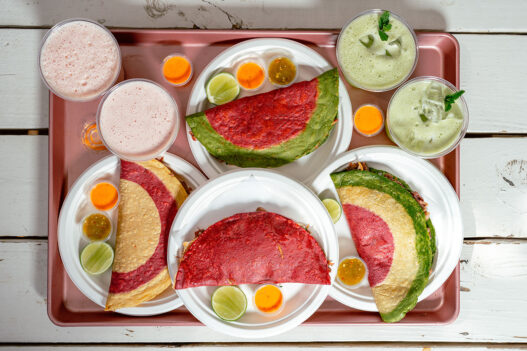 Locals Know ATX Taco Tour group walking through East Austin on Manor Road