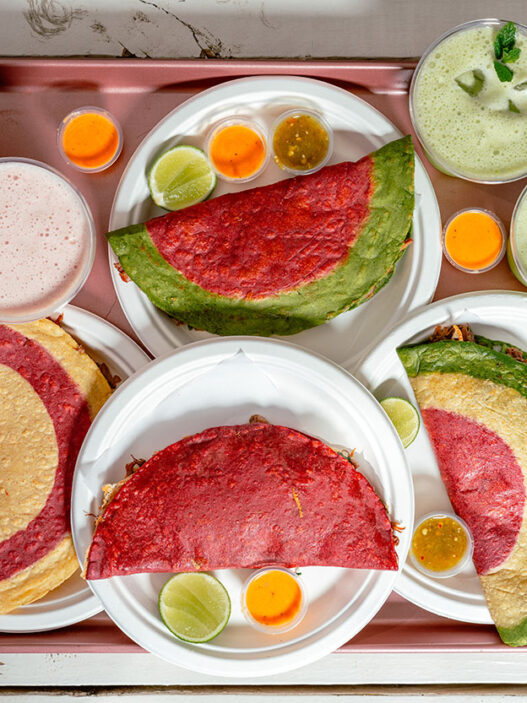 Locals Know ATX Taco Tour group walking through East Austin on Manor Road