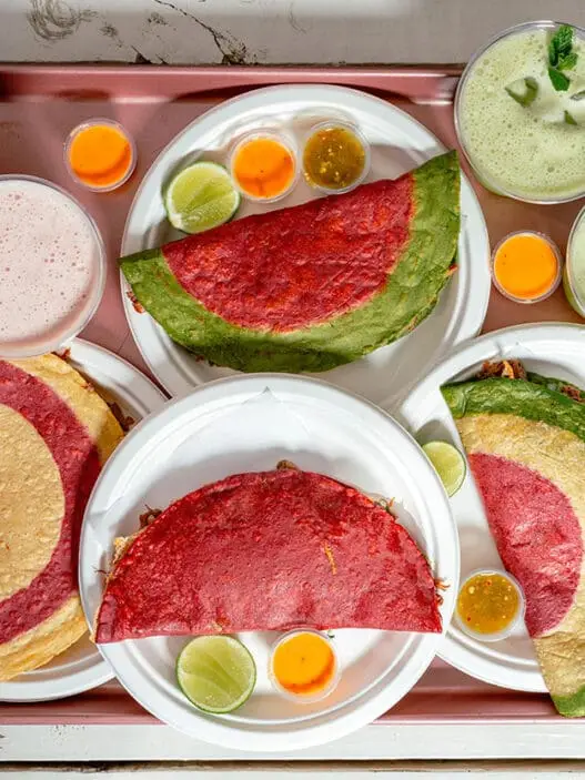 Locals Know ATX Taco Tour group walking through East Austin on Manor Road
